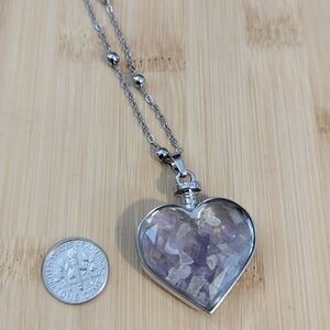 Heart-Shaped Silver Necklace with Purple Gemstones